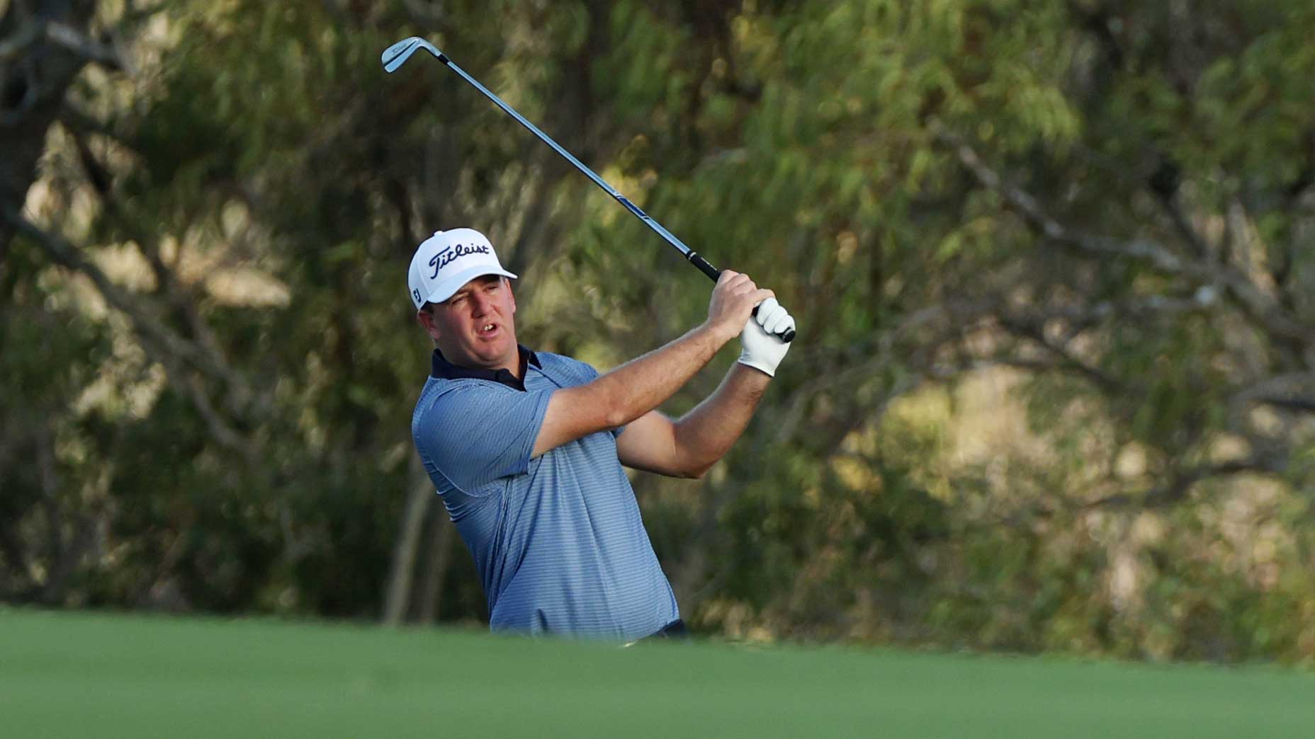 Tom Hoge hits a shot on the fourth hole during the first round of the 2025 Sentry at the Plantation Course at Kapalua Golf Club.