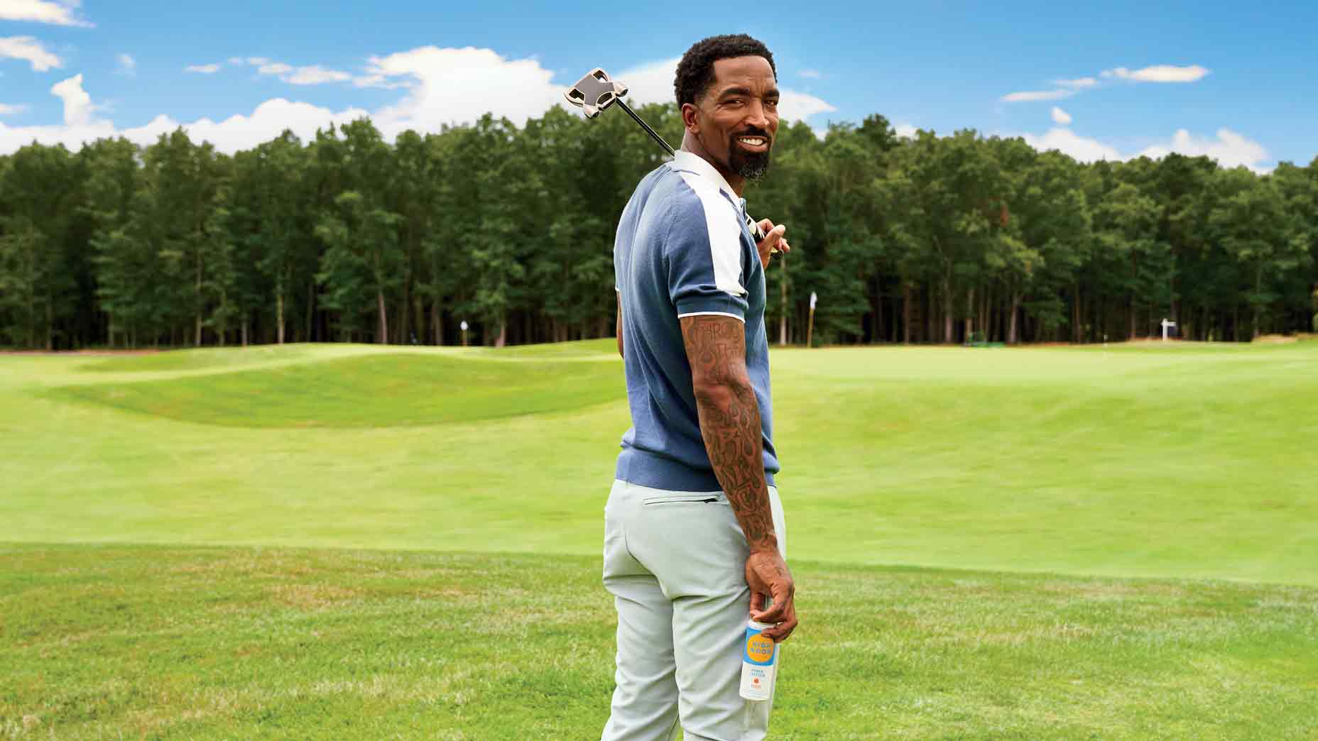 J.R. Smith poses with a can of High Noon on the golf course