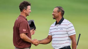 PGA Tour pros Adam Scott and Tiger Woods shake hands on the 18th hole during the second round of the 2024 PGA Championship.