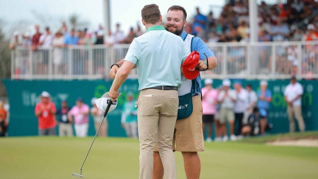 Brian Campbell embraces his caddie Cooper Wilson after winning the 2025 Mexico Open.