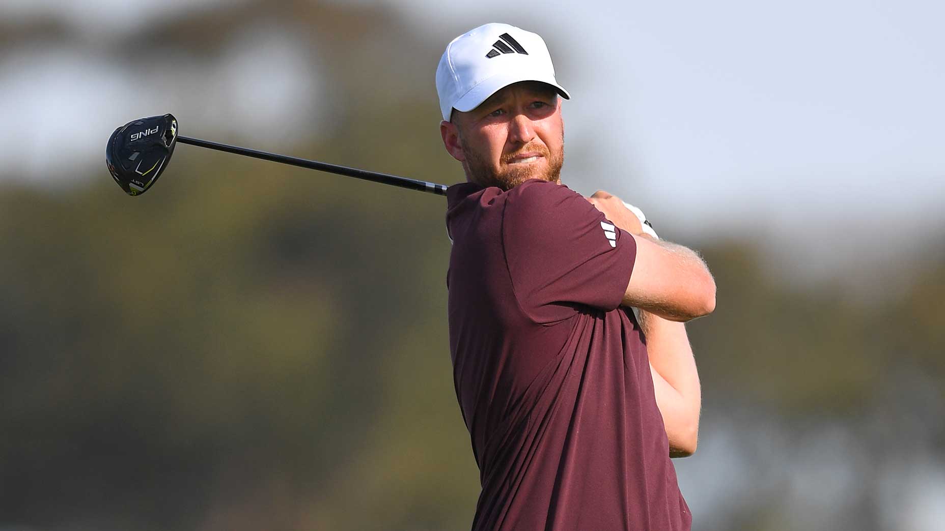 Daniel Berger watches a tee shot