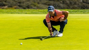 Denny McCarthy reads a putt