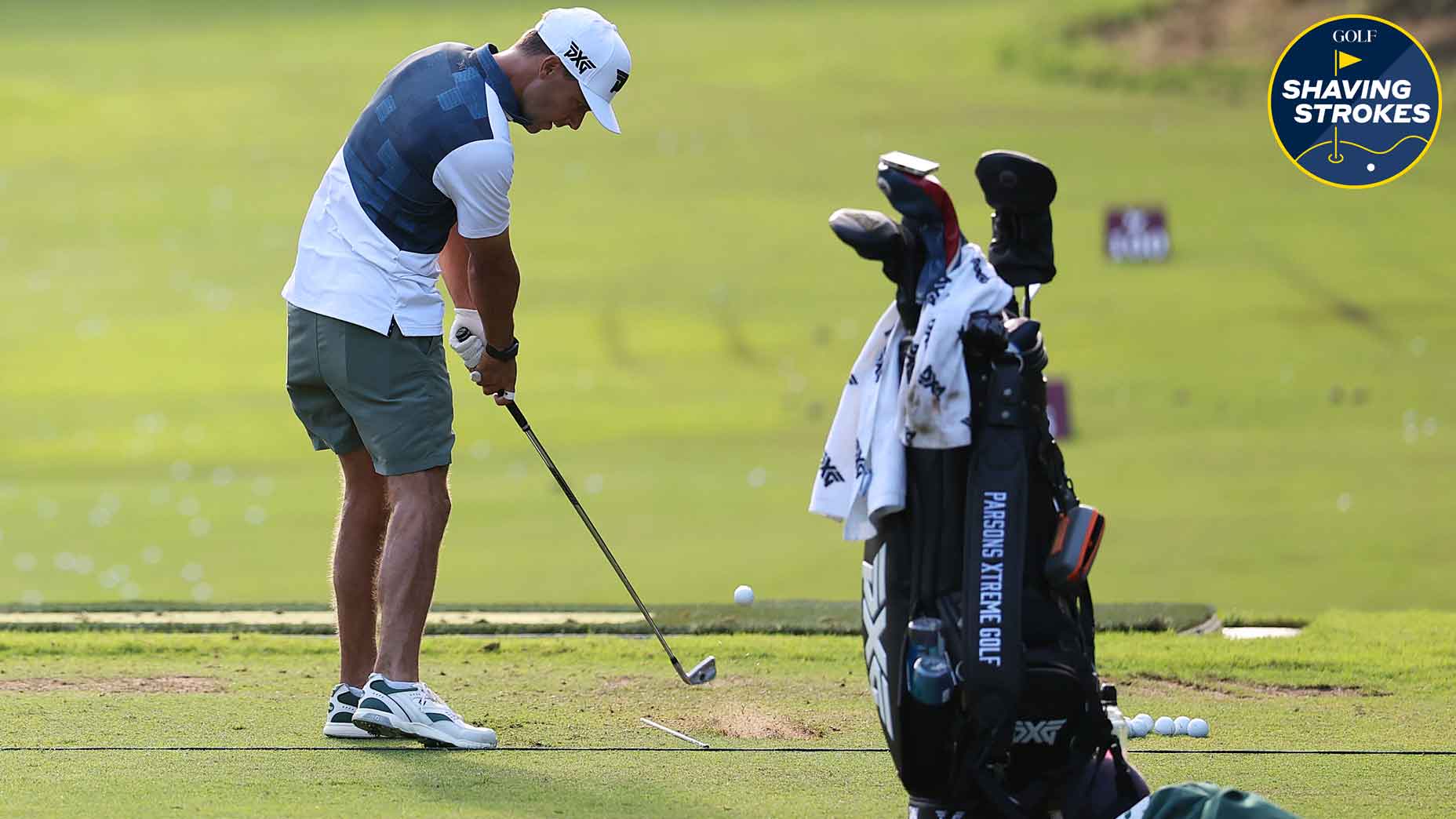 eric cole hits balls on driving range at the sentry