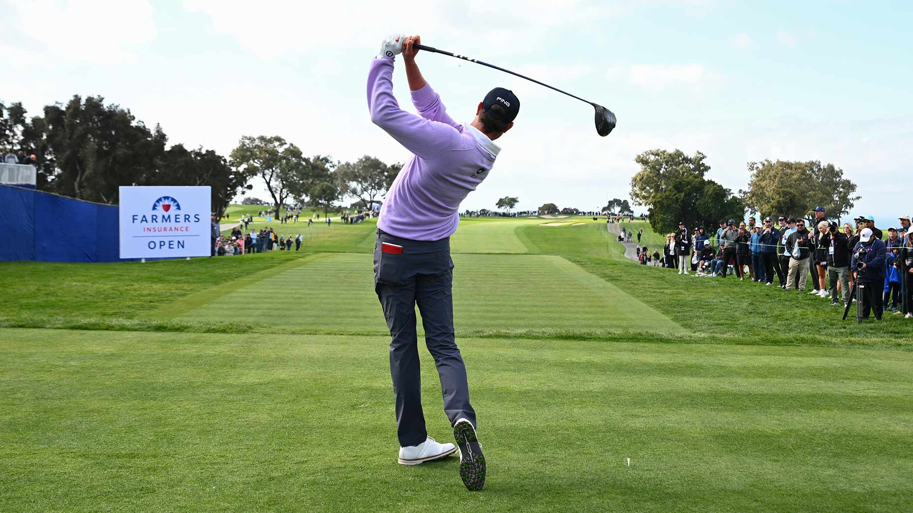 Harris English hits a tee shot at the AT&T Pebble Beach Pro-Am.