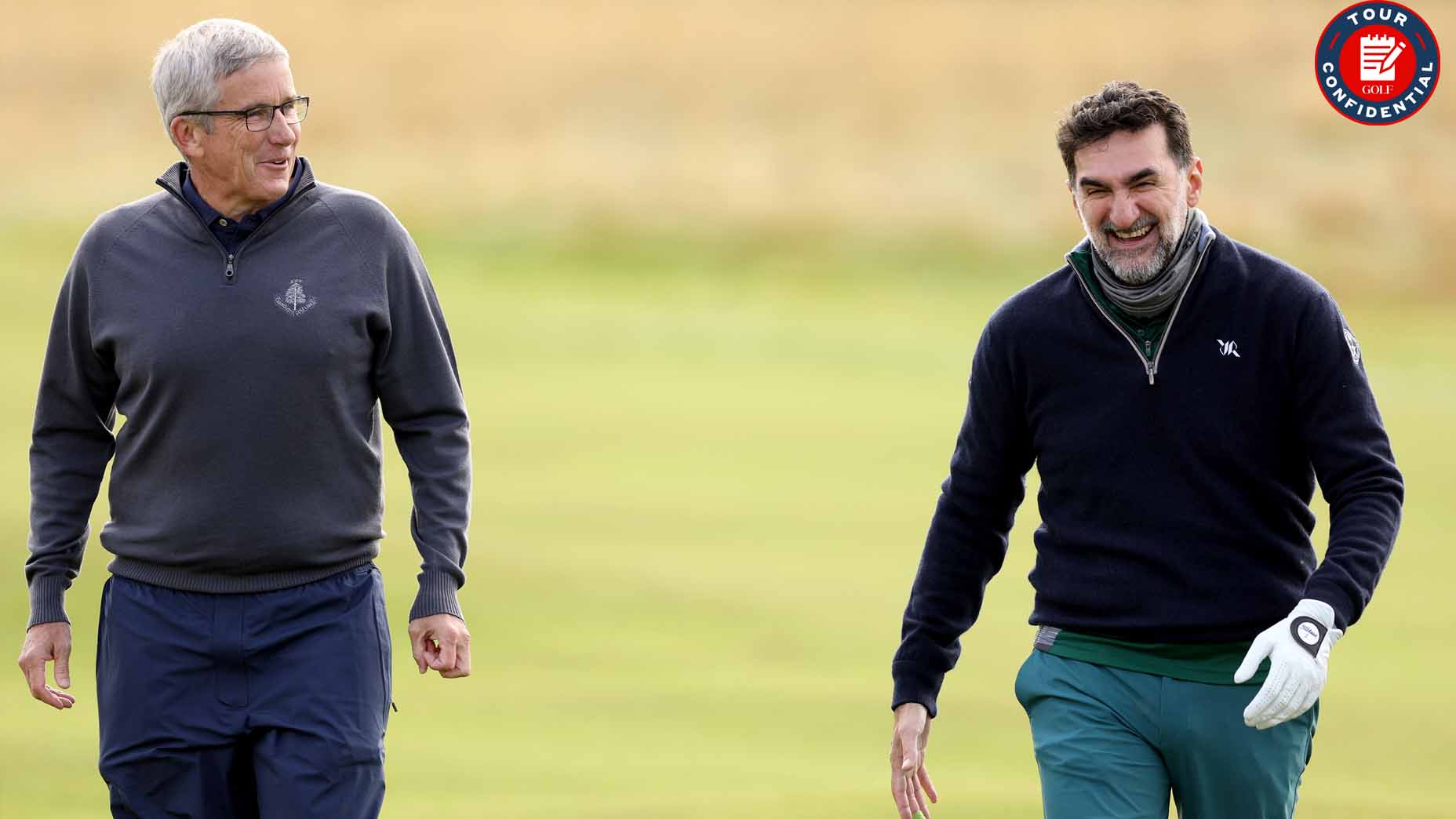 PGA Tour commissioner Jay Monahan and Yasir Al-Rumayyan chat at the Alfred Dunhill Links Championship.