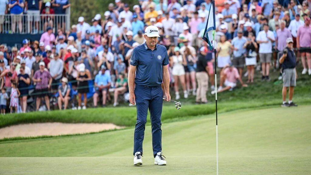 PGA Tour pro Keegan Bradley uses AimPoint to read his putt on the 18th hole green during the final round of the 2024 BMW Championship at Castle Pines.