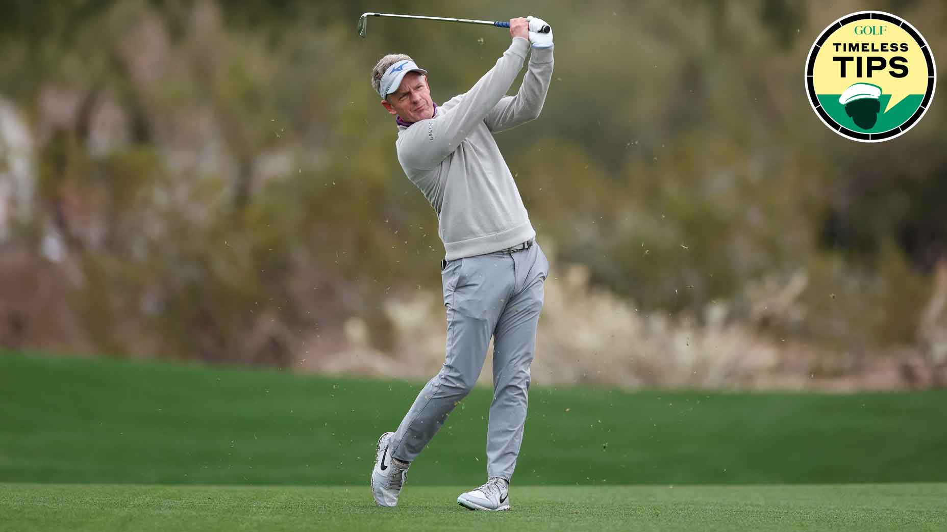 luke donald hits an iron during the 2024 wm phoenix open