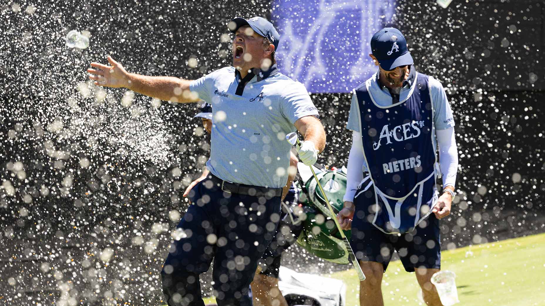 Patrick Reed celebrates (and is showered in drinks) after making an ace on the 12th hole during the first round of LIV Golf Adelaide at Grange Golf Club on Friday.