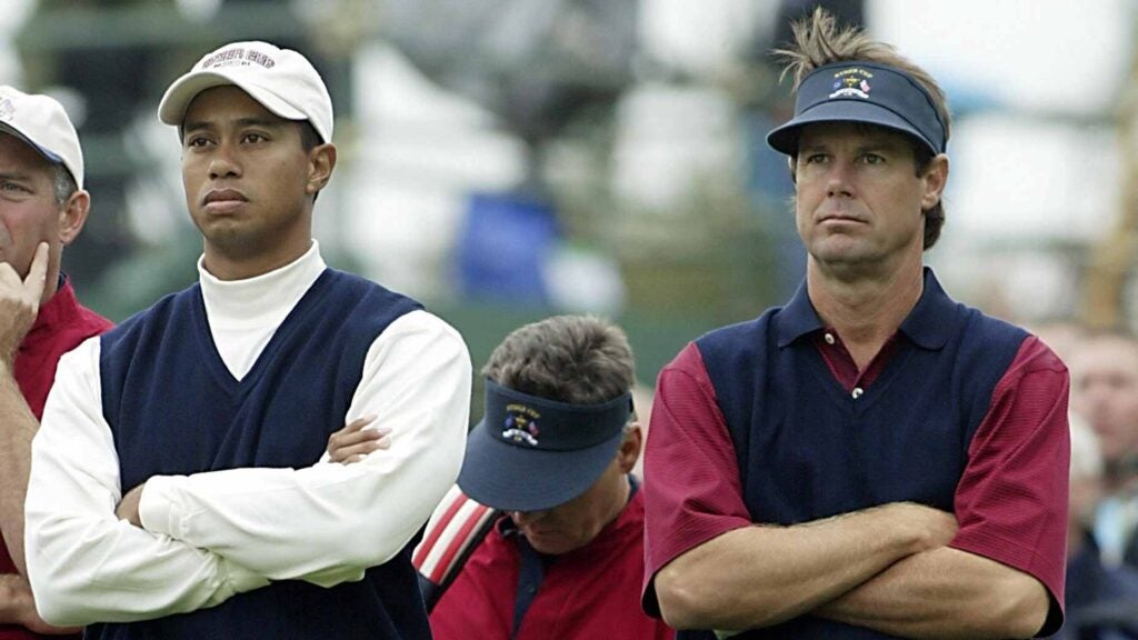 Paul Azinger and Tiger Woods stand on tee box during their match at the 2002 Ryder Cup at The Belfry in Sutton Coldfield, England.