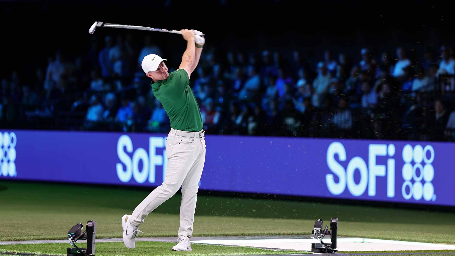 TGL player Rory McIlroy of Boston Common Golf plays a shot during their TGL presented by SoFi match against the Jupiter Links Golf Club at SoFi Center.