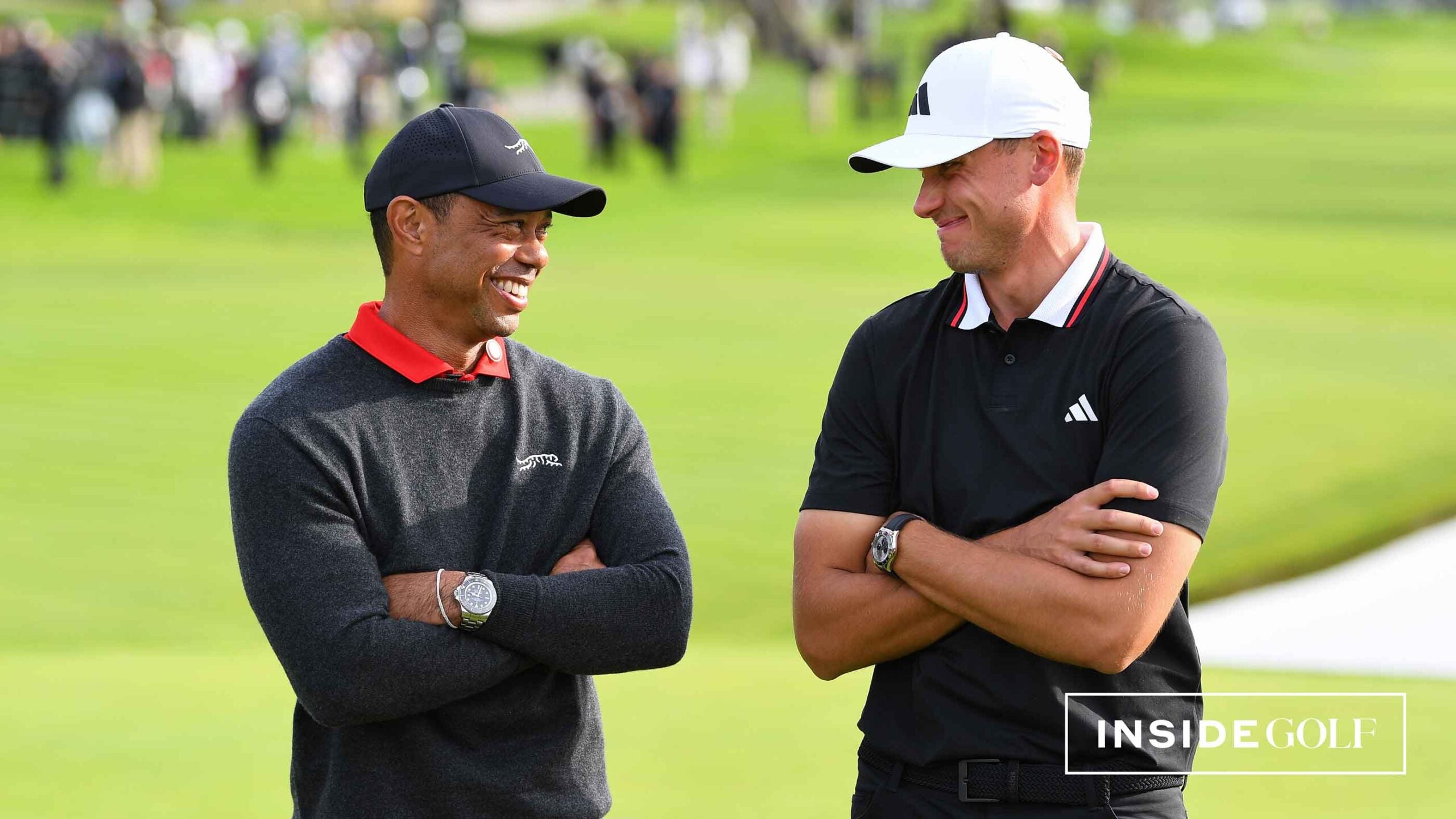 Tiger Woods jokes with winner Ludvig Aberg during the trophy ceremony following the final round of The Genesis Invitational 2025 at Torrey Pines Golf Cours