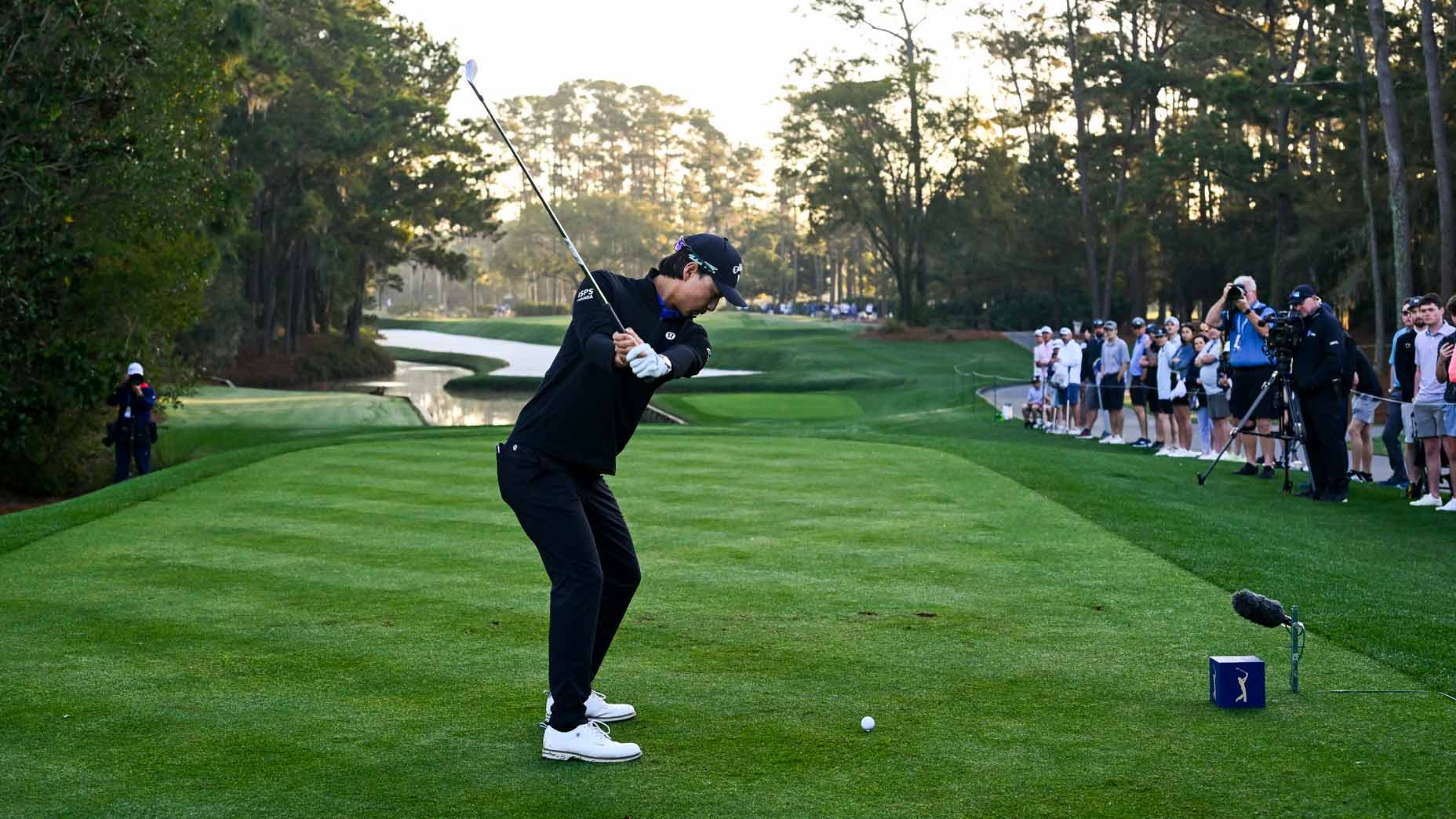 Min woo lee hits a fierce kick in TPC Sawgrass.