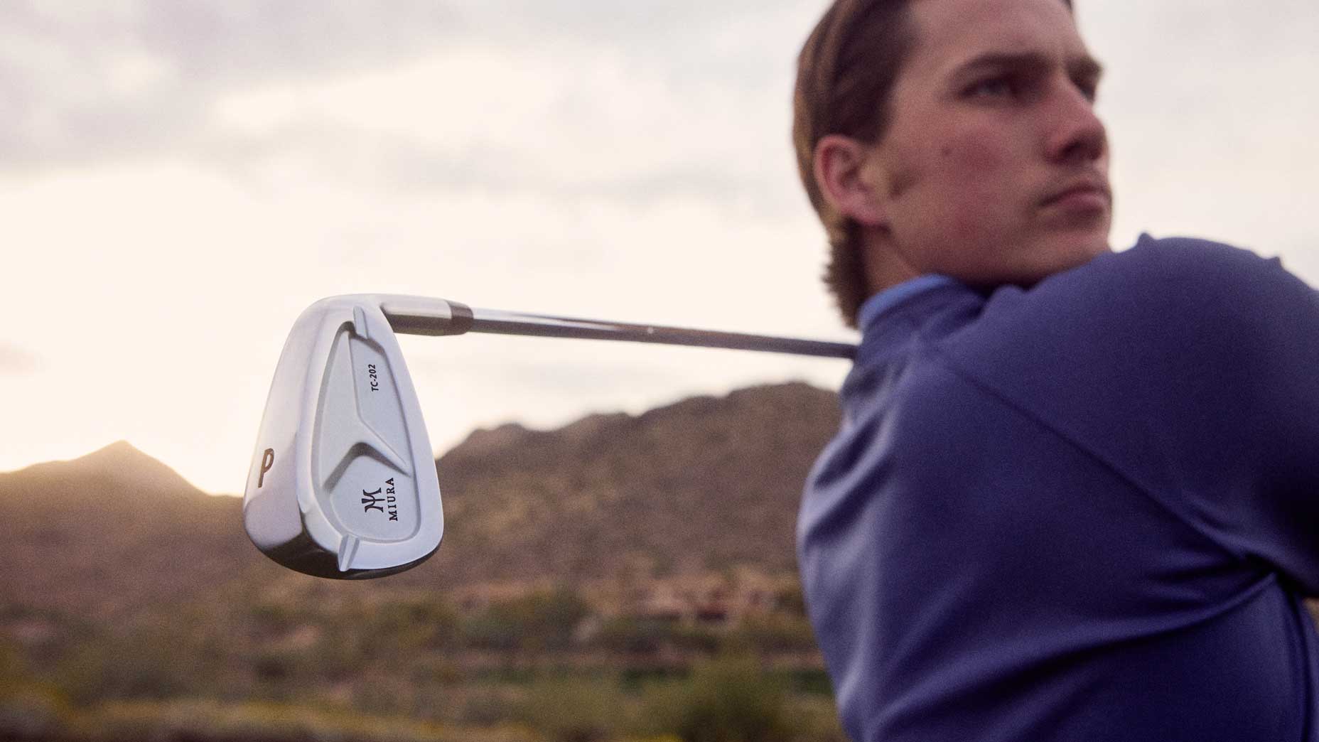 A golfer with a Miura TC 202 iron.