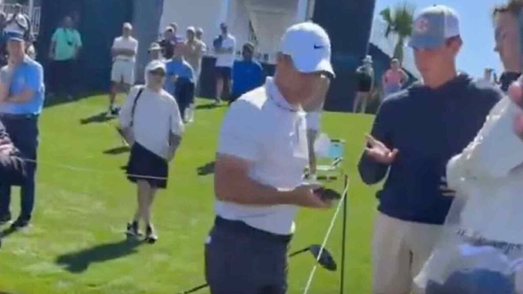 rory mcilroy grabbing heckler's phone at players championship