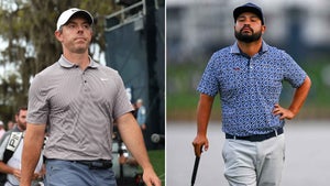 Rory McIlroy and JJ Spaun walk at the Players.