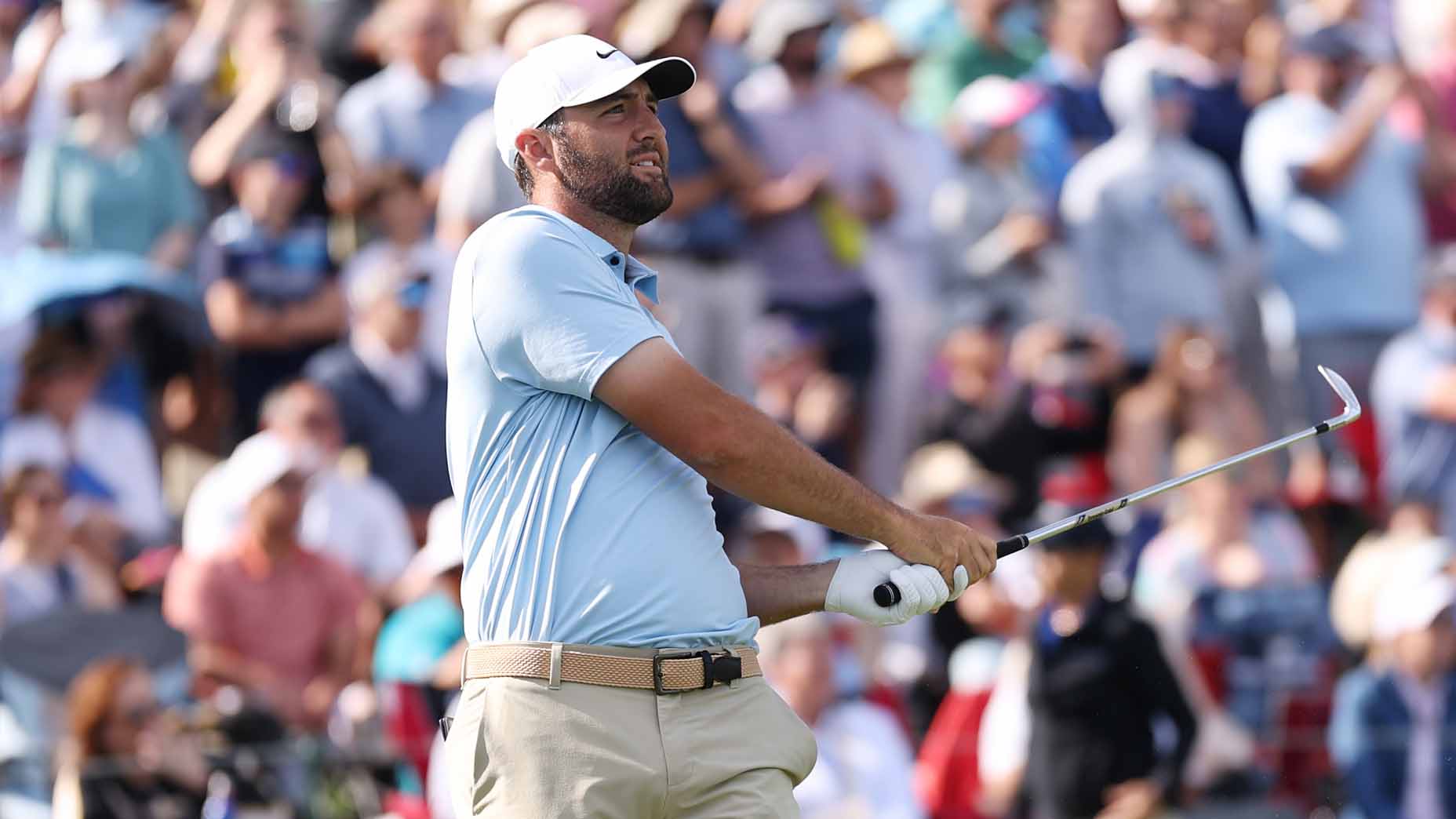 Scottie Scheffler hits a tee shot during the 2025 Players Championship at TPC Sawgrass.