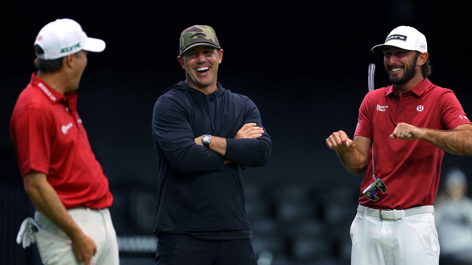 Brooks Koepka and PGA Tour pros Max Homa and Kevin Kisner of Jupiter Links Golf Club talk before the TGL presented match on February 25, 2025.