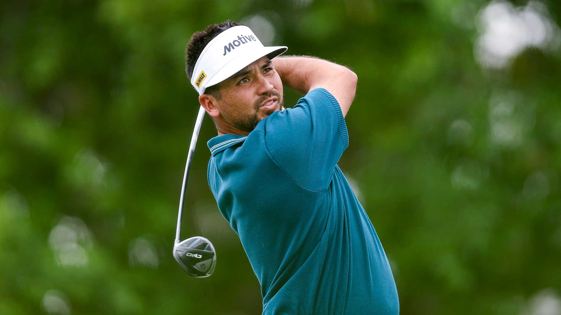 jason day hits a tee shot