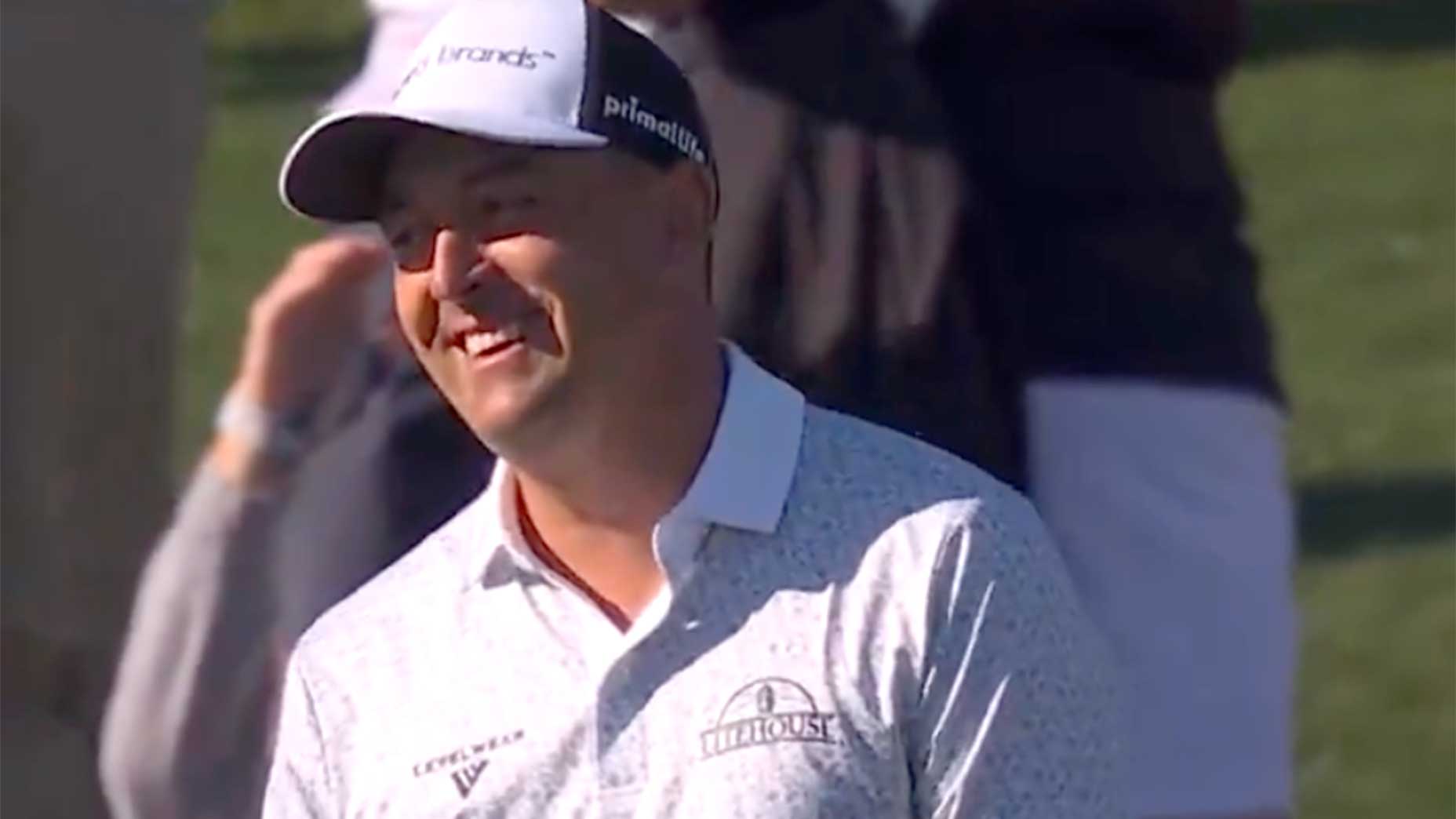 justin lower reacts to his hole-out par at the players championship