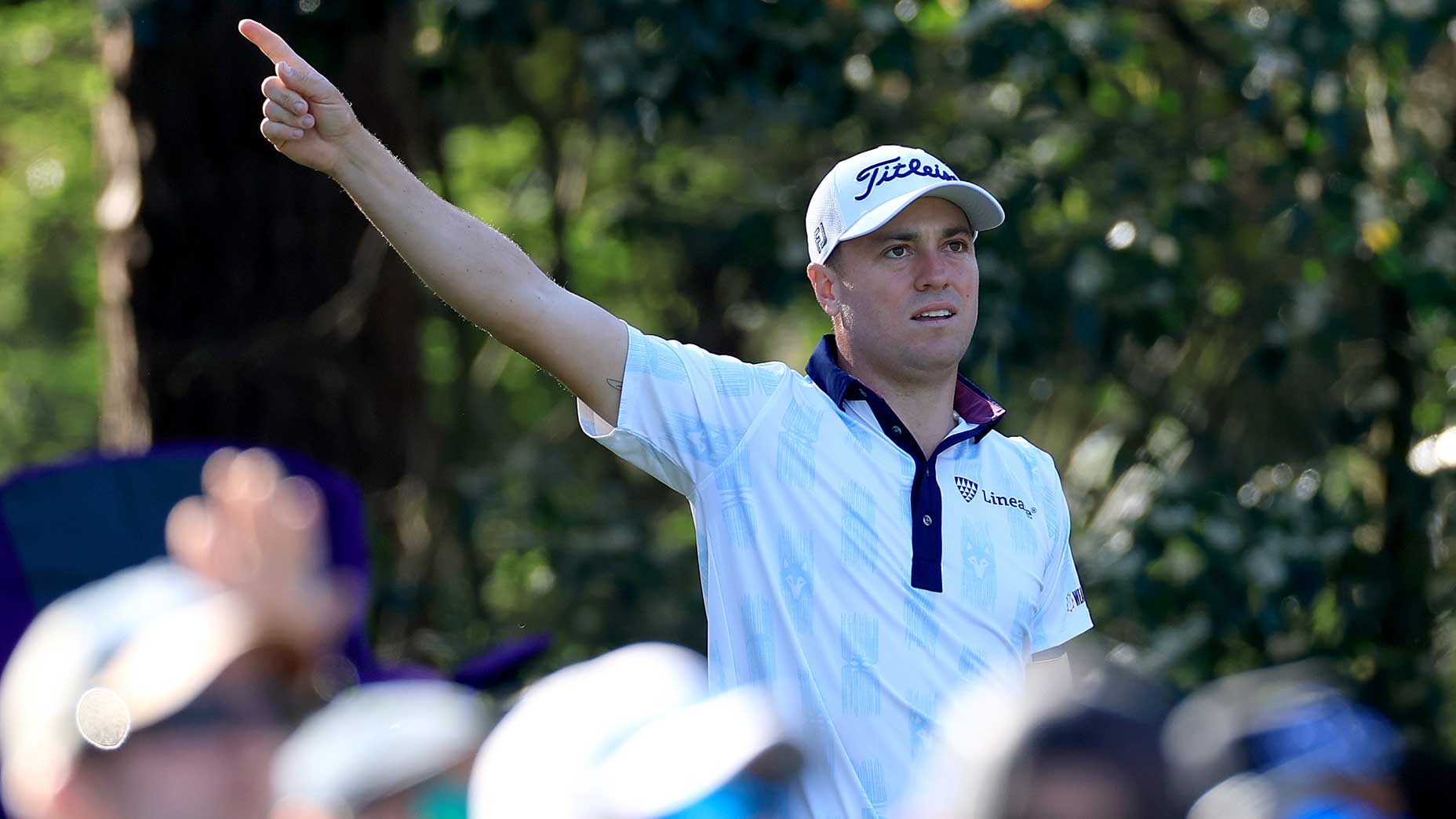 Justin Thomas reacts to a Thursday blow to players