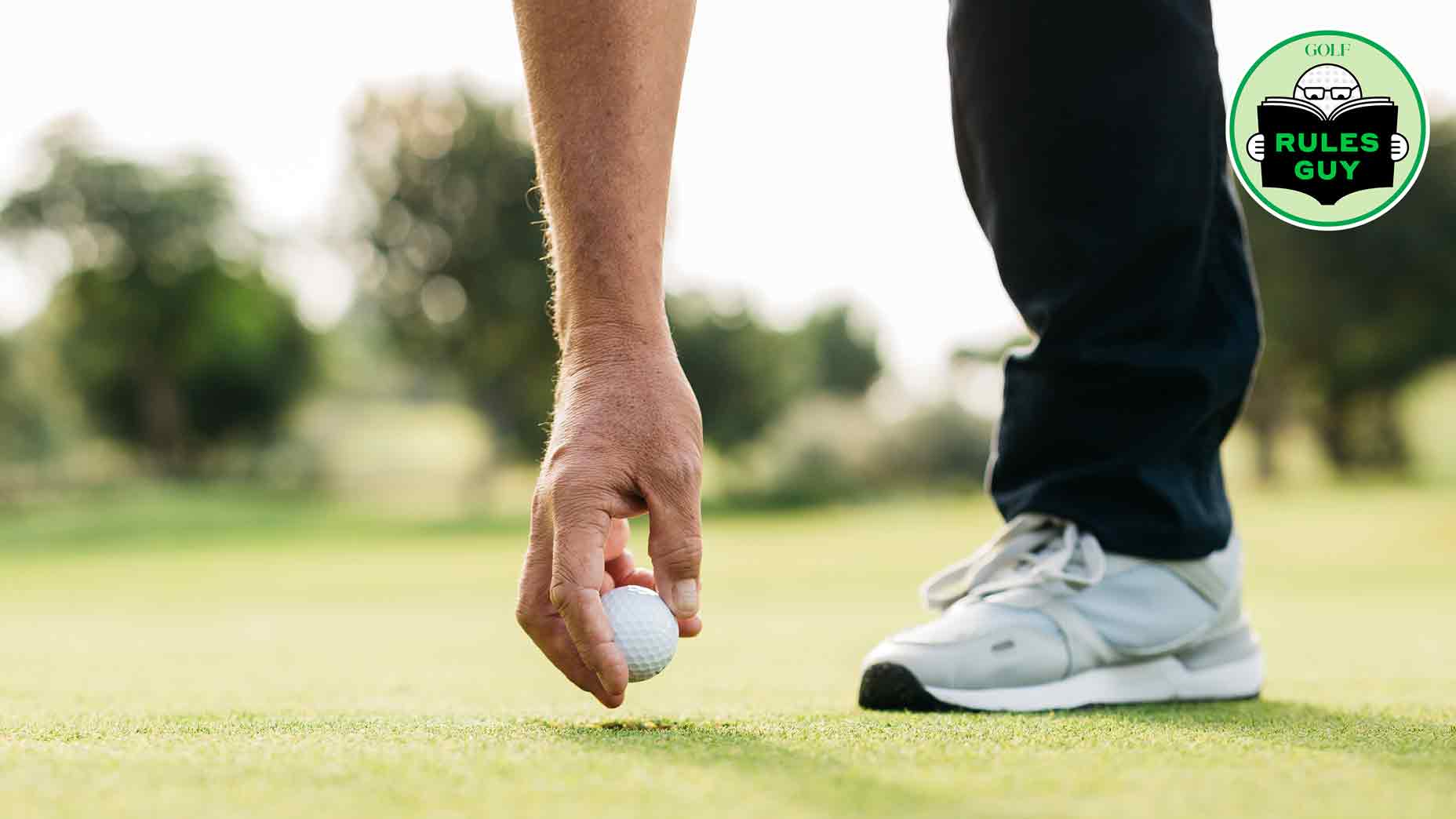 Man replacing the ball