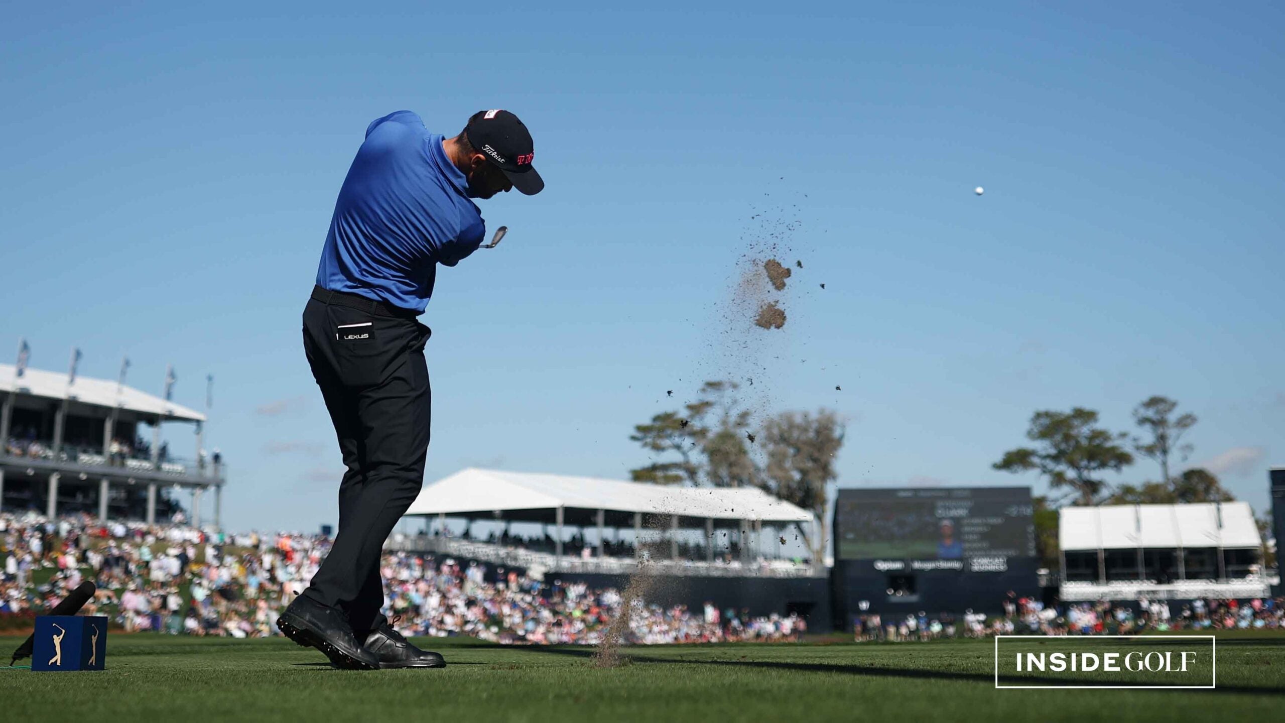 Wyndham Clark of the United States plays his shot from the 17th tee during the first round of THE PLAYERS Championship on the Stadium Course at TPC Sawgrass