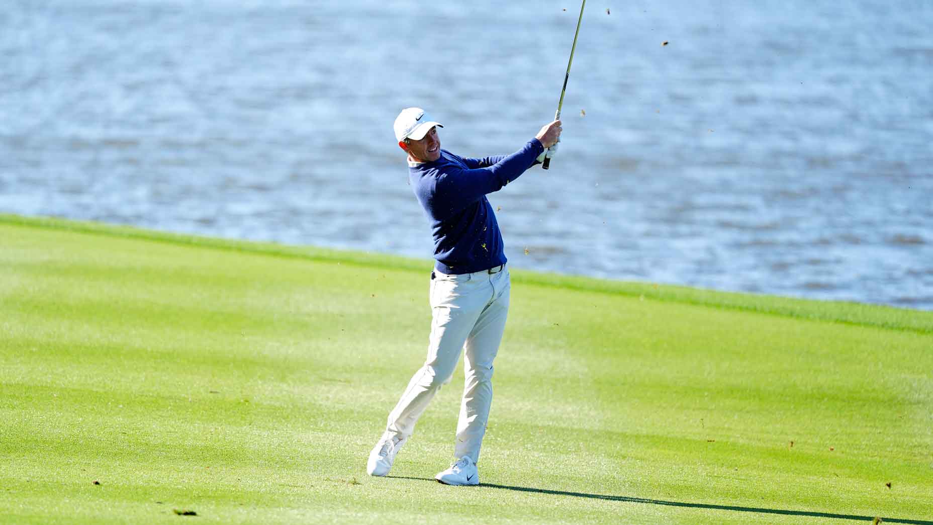 rory mcilroy hits shot during the 2025 players championship