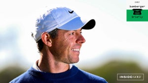 Rory McIlroy of Northern Ireland poses with the trophy after defeating J.J. Spaun in a playoff in the final round to win THE PLAYERS Championship 2025