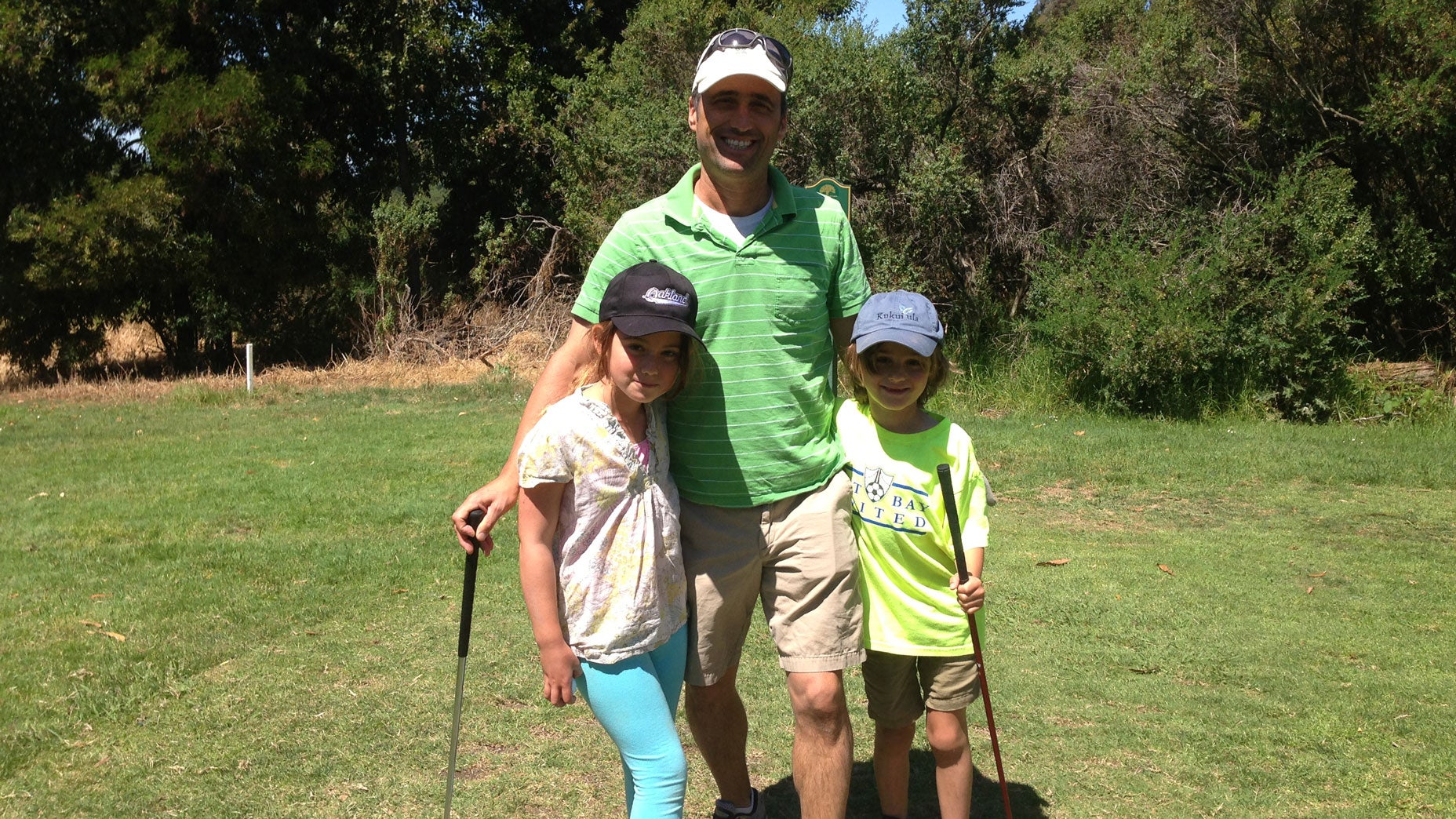 Sign Sense with his two children, Scarlett and Leo, before giving up golf.