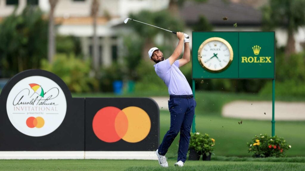 Scottie Scheffler, betting favorite in the 2025 Arnold Palmer Invitational odds, plays his tee shot on the 14th hole during the final round of the 2024 event.