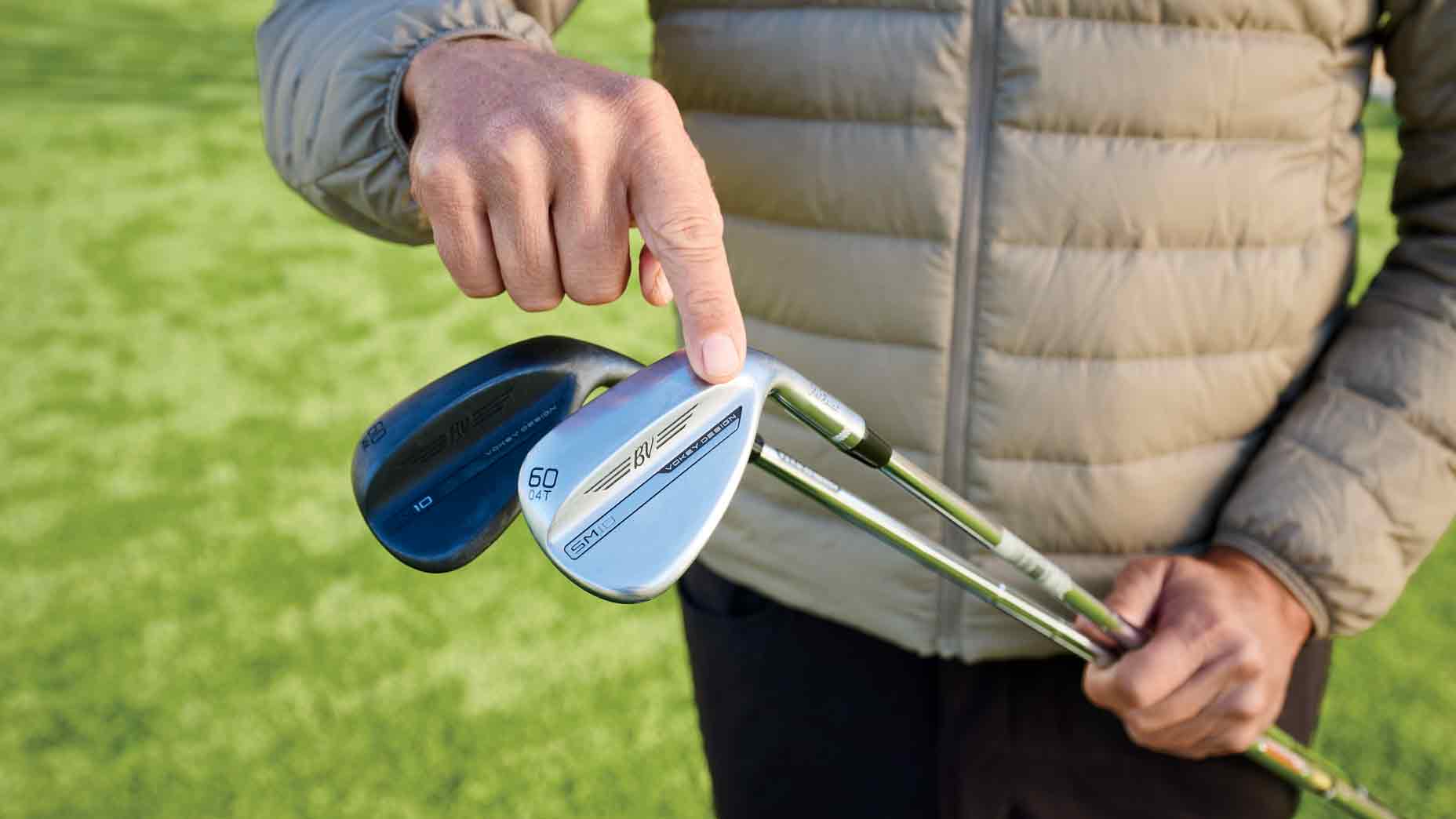 Parker McLaughlin holds two wedges