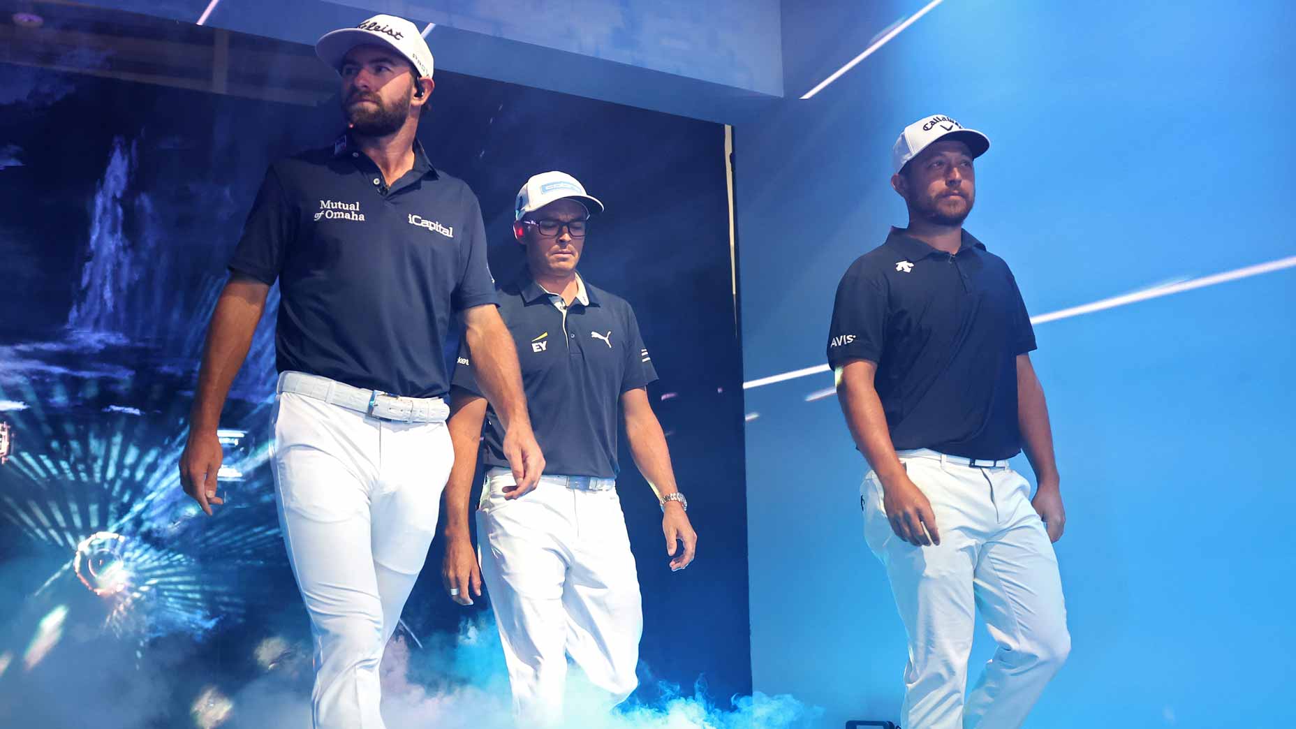 Cameron Young, Rickie Fowler and Xander Schauffele of New York Golf Club - who will be featured in TGL TV coverage for the finals - are introduced before their TGL semifinals match.