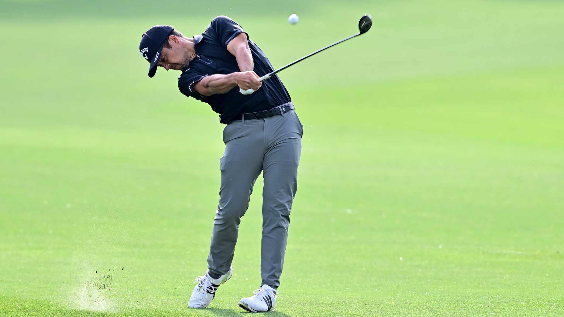 PGA Tour pro Xander Schauffele plays a shot on the 14th hole during the first round of the 2025 Valspar Championship at Innisbrook Resort and Golf Club.