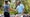 Scottie Scheffler and Xander Schauffele of the United States react on the 16th green prior to THE PLAYERS Championship on the Stadium Course at TPC Sawgrass