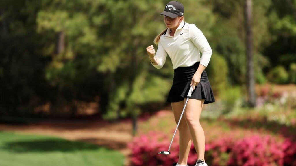 carla bernat escuder fist pumps after making a putt at the augusta national womens amateur