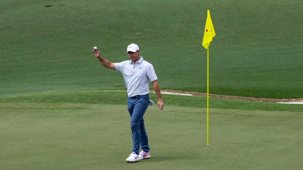 Rory McIlroy waves to patrons saturday at the masters