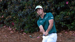 Viktor Hovland hits a chip during the 2023 Masters.