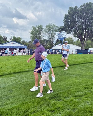 Silas and Gary Woodland at Oakmont.