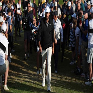 US golfer Scottie Scheffler walks to the 18th tee on day three of the 153rd Open Championship at Royal Portrush golf club in Northern Ireland on July 19, 2025.