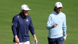 Tommy Fleetwood and Tyrrell Hatton interact at the BMW PGA Championship