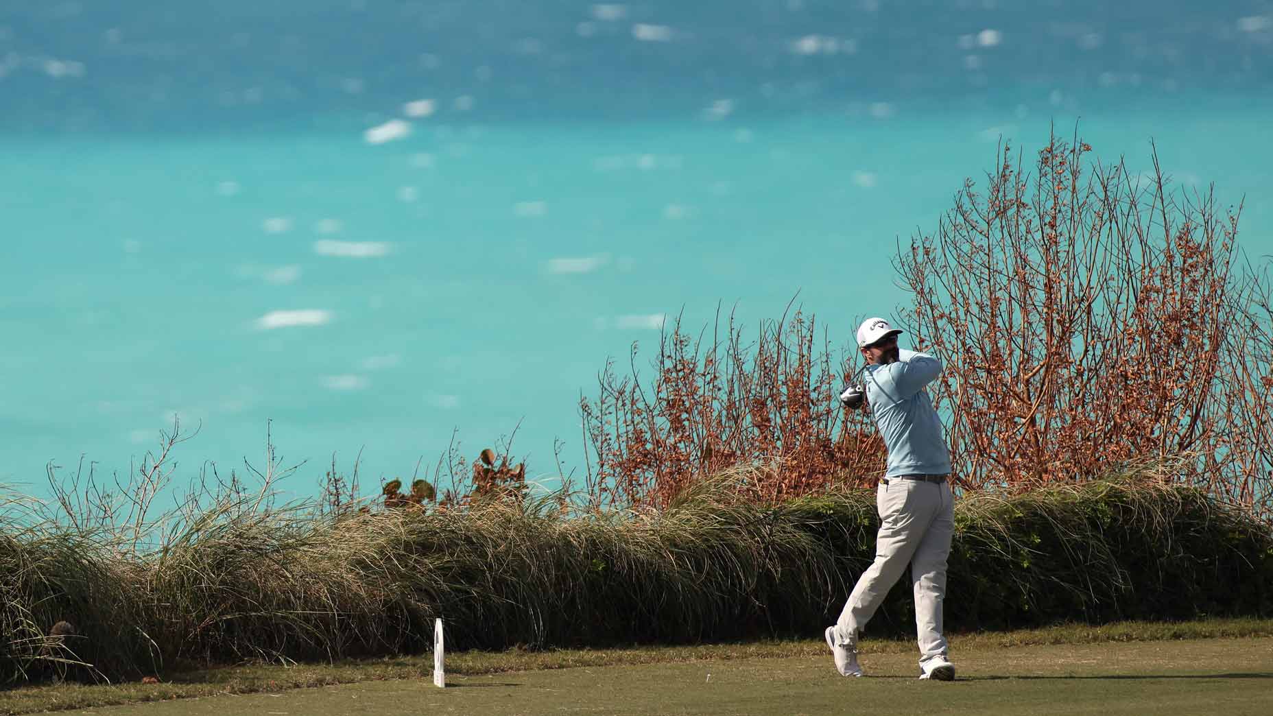 Adam Hadwin of Canada plays his shot from the ninth tee during the third round of the Butterfield Bermuda Championship 2025 at Port Royal Golf Course on November 15, 2025 in Southampton, Bermuda.