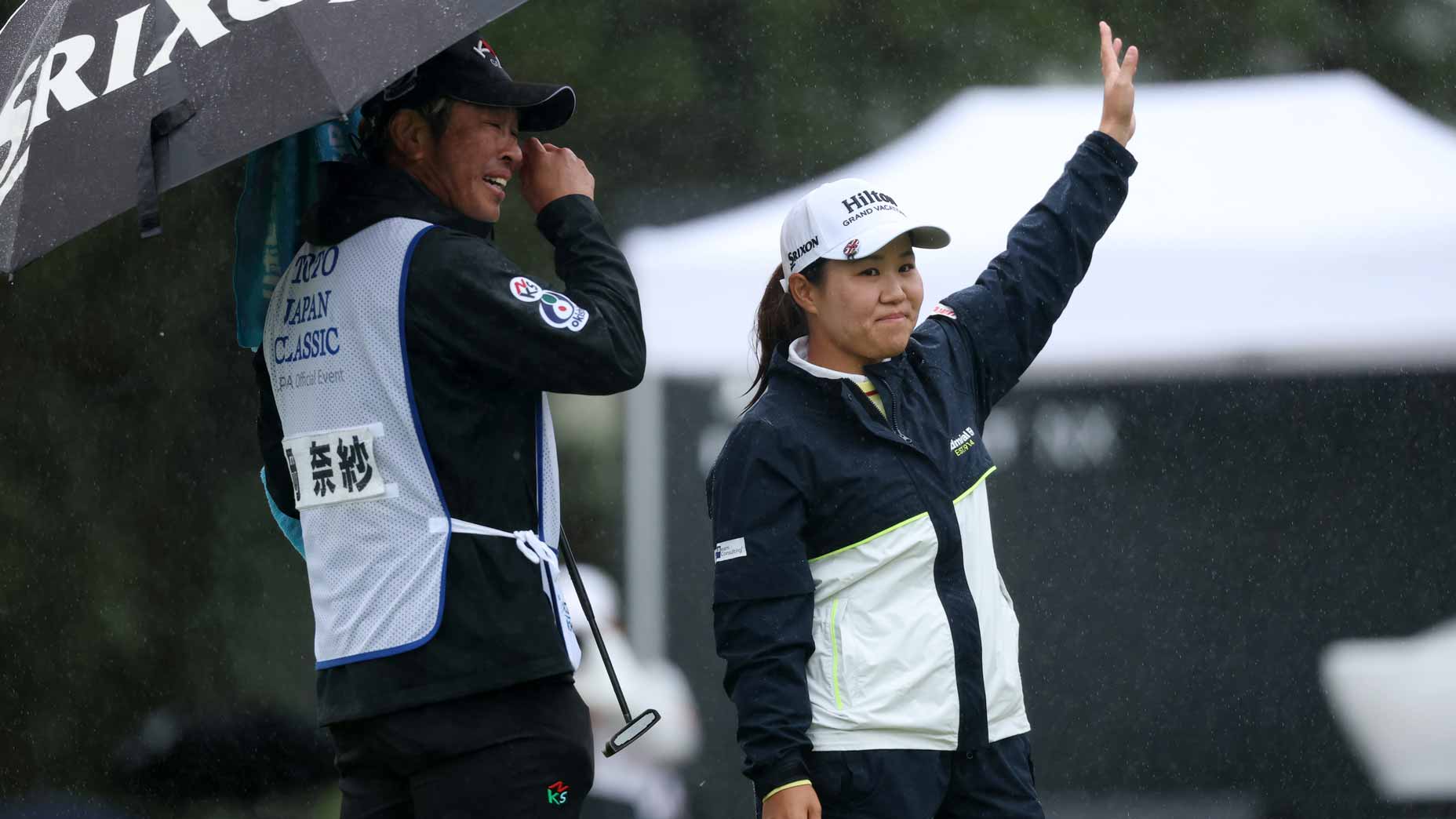 LPGA pro Nasa Hataoka waves to fans after winning the 2025 TOTO Japan Classic in a playoff.