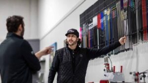 A True Spec fitter pulls a shaft from the shaft wall during a fitting.