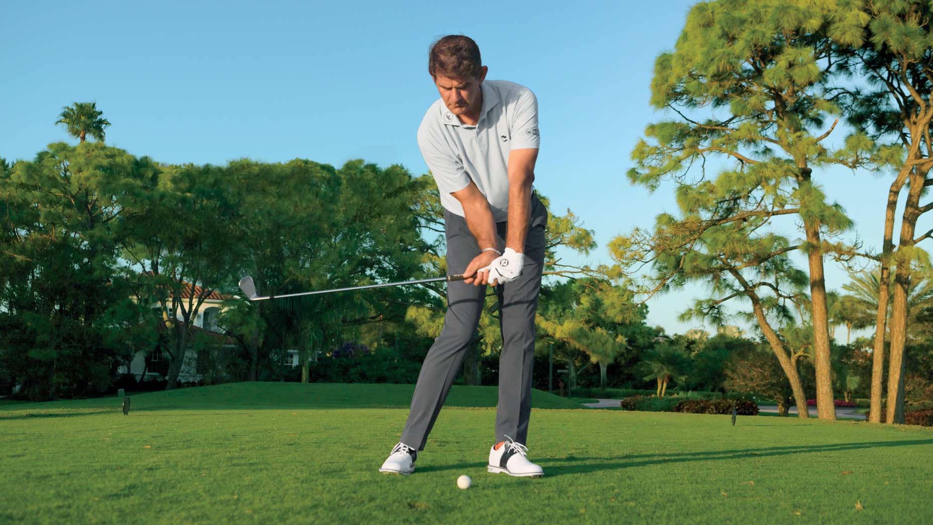 Do this move with your trail elbow for more crisp ball striking Do this move with your trail elbow for more crisp ball striking