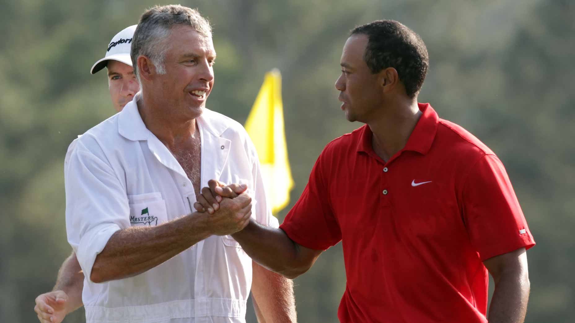 Tiger Woods and Caddy Steve Williams welcome after the final round of the 2011 Masters.
