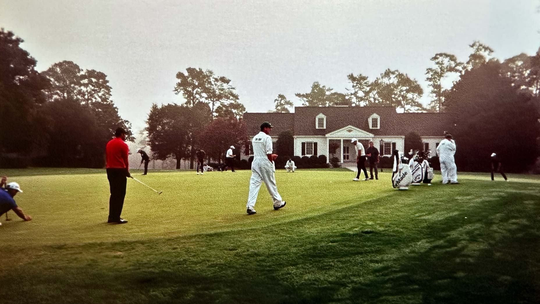 Tiger Woods and Scottie Scheffler warming up ahead of the 2020 Masters.