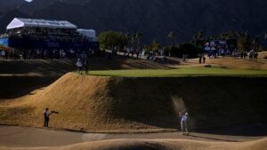 cameron young hits shot from deep bunker during the 2025 american express