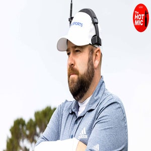 colt knost stands with a headset on CBS Sports tower.