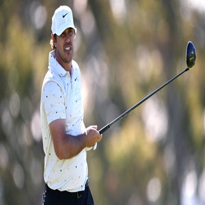 Brooks Koepka hits shot during 2026 Farmers Insurance Open at Torrey Pines.
