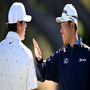 Hideki Matsuyama greets Brooks Koepka prior to the PGA Tour's 2026 Farmers Insurance Open at Torrey Pines.